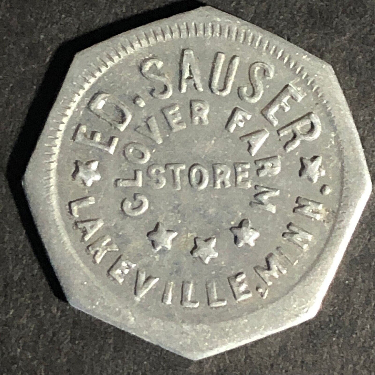 Ed. Sauser Clover Farm Store Lakeville, MN 5c Octagon Alum. Token 20.7mm Scarce