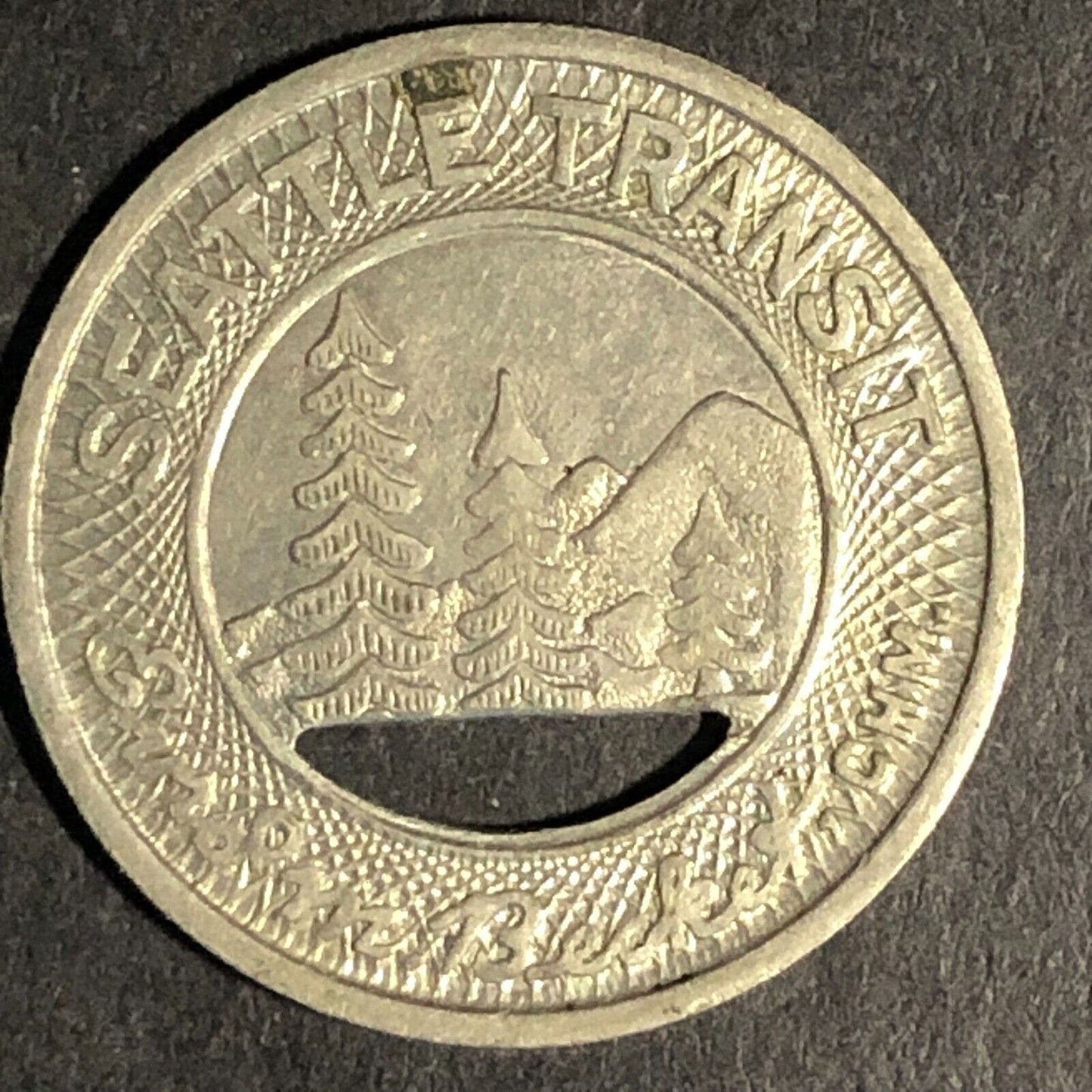 Seattle "Good For Child's Fare" Brass Transit Token -- 21mm w/ Pine Trees