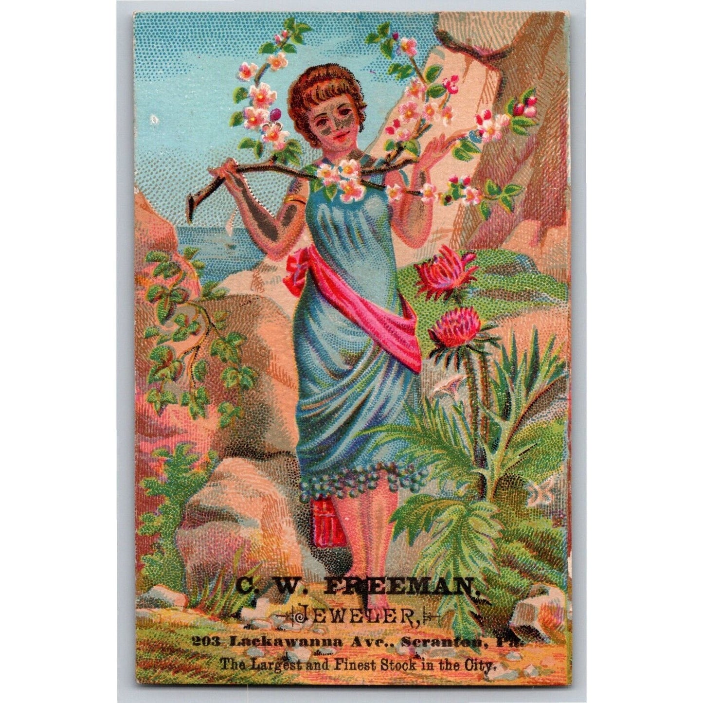 C.W. Freeman Jeweler Scranton, PA Girl w/ Flowers Victorian Trade Card