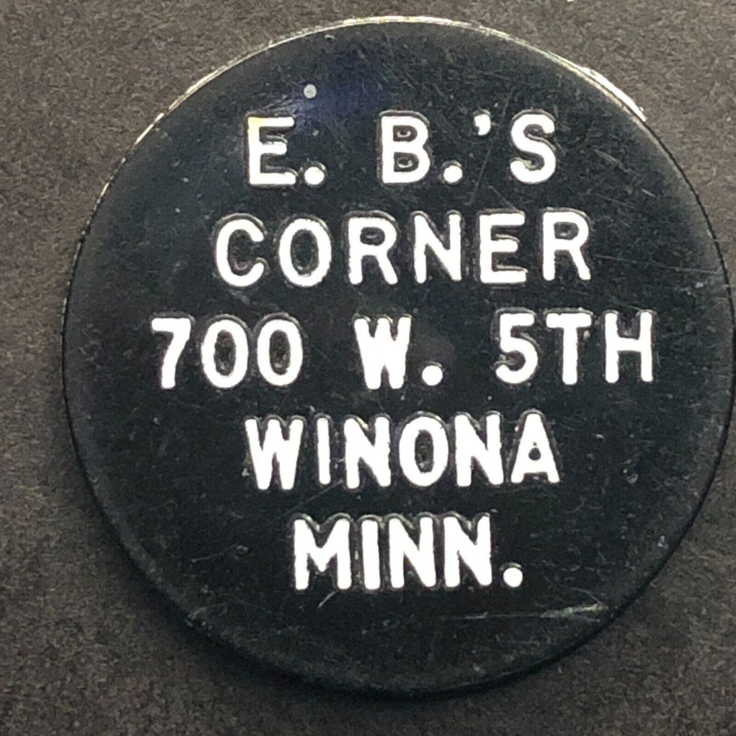 Winona, WI "E.B.'s" Plastic G/F 20¢ In Trade Token 22.65mm c1960's-70's