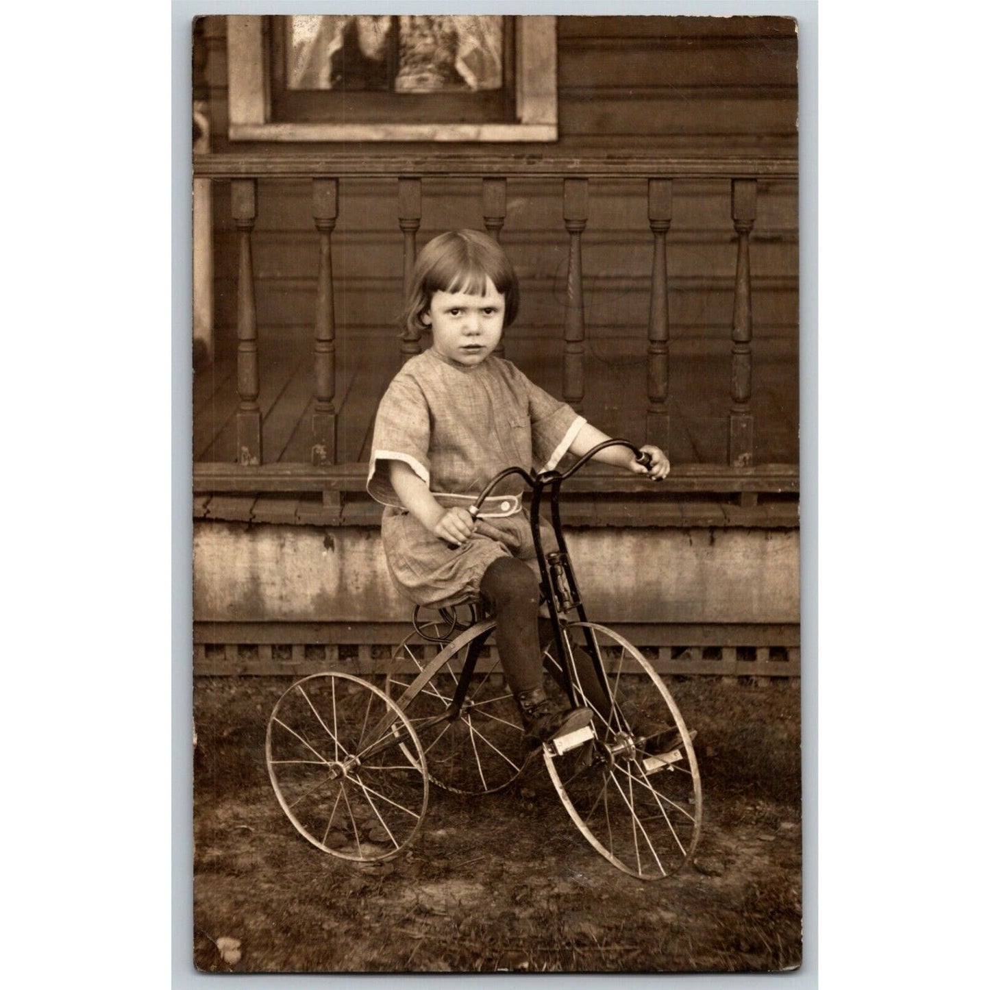 Vintage RPPC Postcard c1912 Child Near House Posing on Bicycle / Tricycle