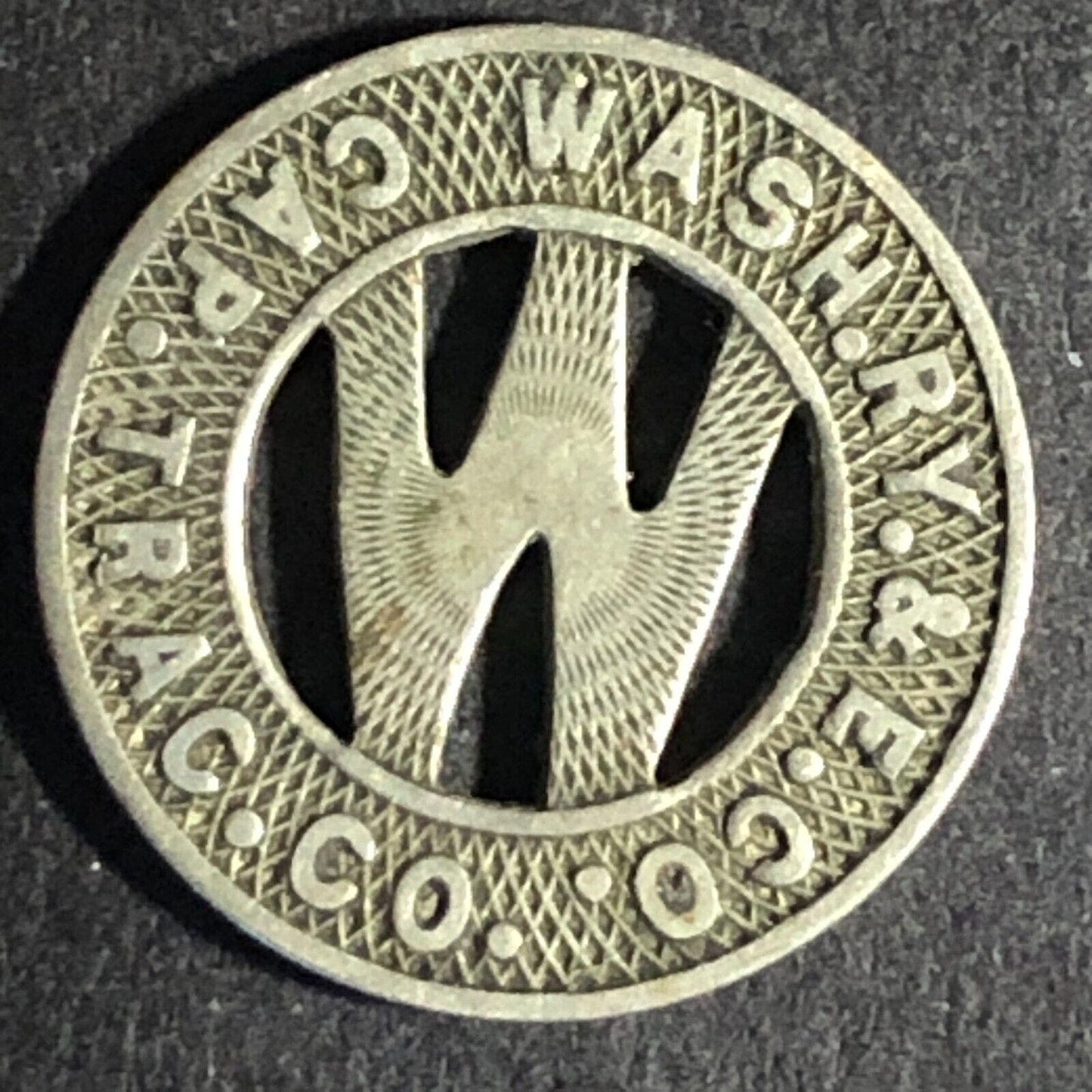 Wash. RY. & E. Co. Cap. Trac. Co. WM One Fare Dist. of Col. 2 Token -- 16.5mm