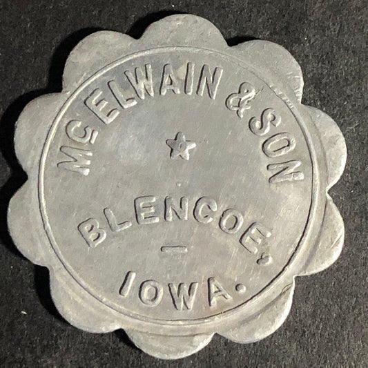 McElwain & Son Blencoe, Iowa G/F 25c Alum Scalloped Token 29.25mm Scarce