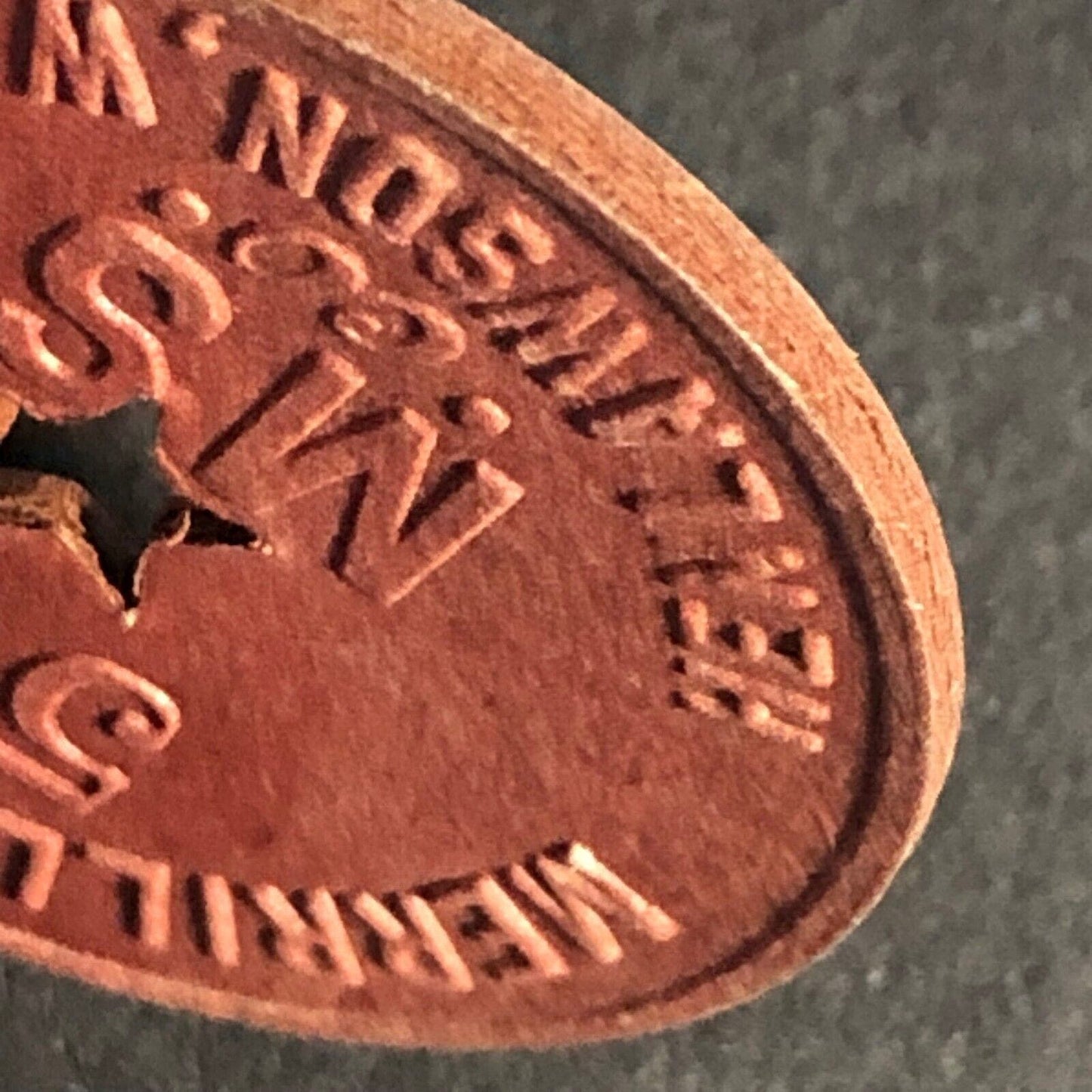 Merrill Stores Henlawson, W. VA Burgundy Red Fiber 50 Token 28.55mm Star Cutout
