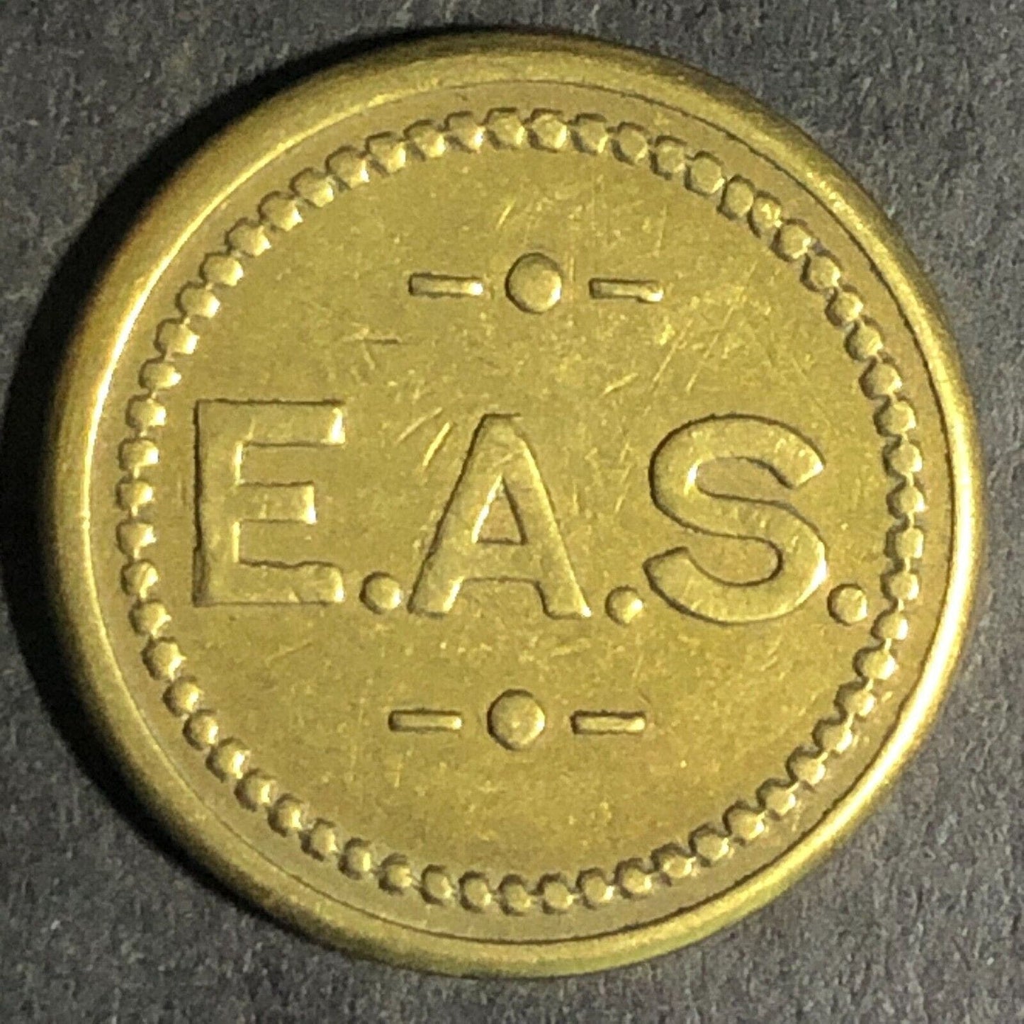 E.A.S. (Eatonville, WA - Edward A. Skennis) Brass G/F 5c In Trade Token 21mm