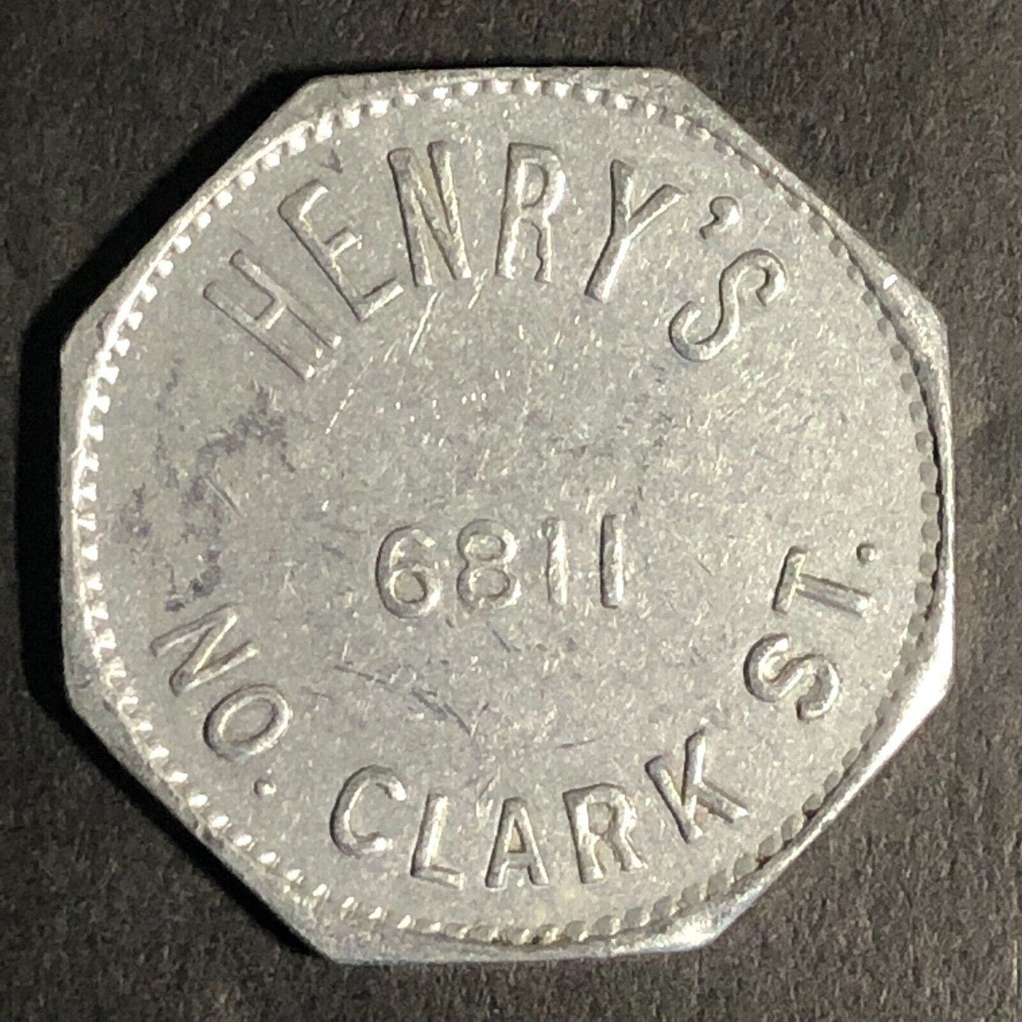 Henry's 6811 No. Clark St (Chicago, IL) Alum. G/F 5c Trade Token Hexagon - 23mm