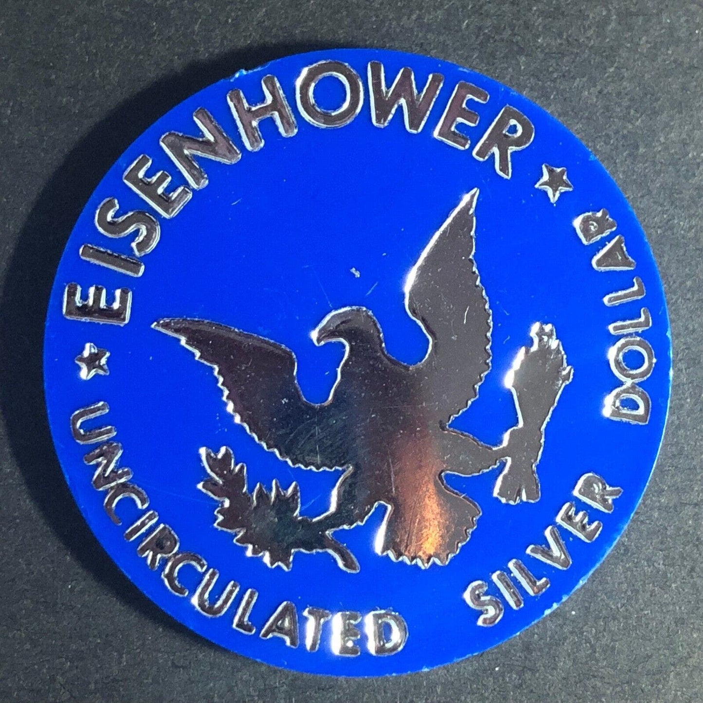 Eisenhower "Uncirculated Silver Dollar" Blue Plastic Foil Stamped Token 37mm VGC