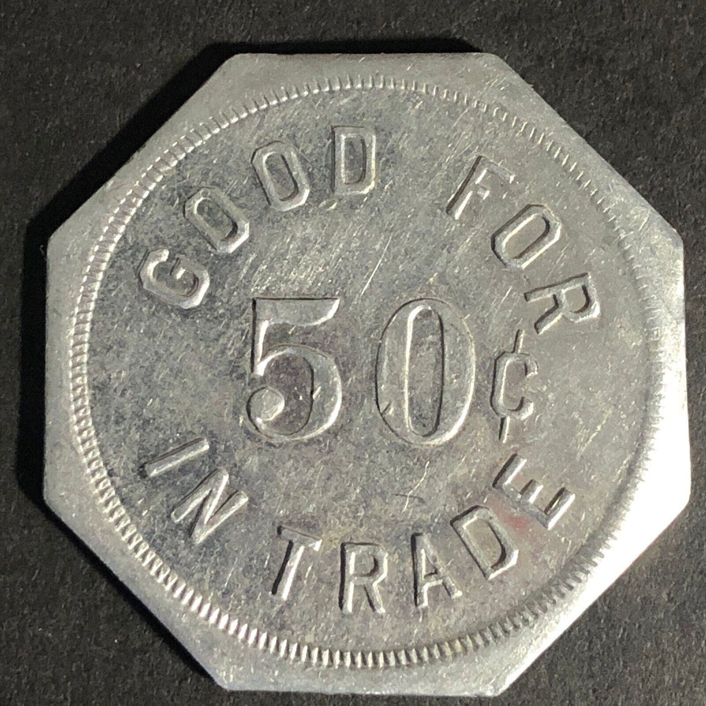 Ed. Sauser Clover Farm Store Lakeville, MN 50c Octagon Alum. Token 32mm Scarce