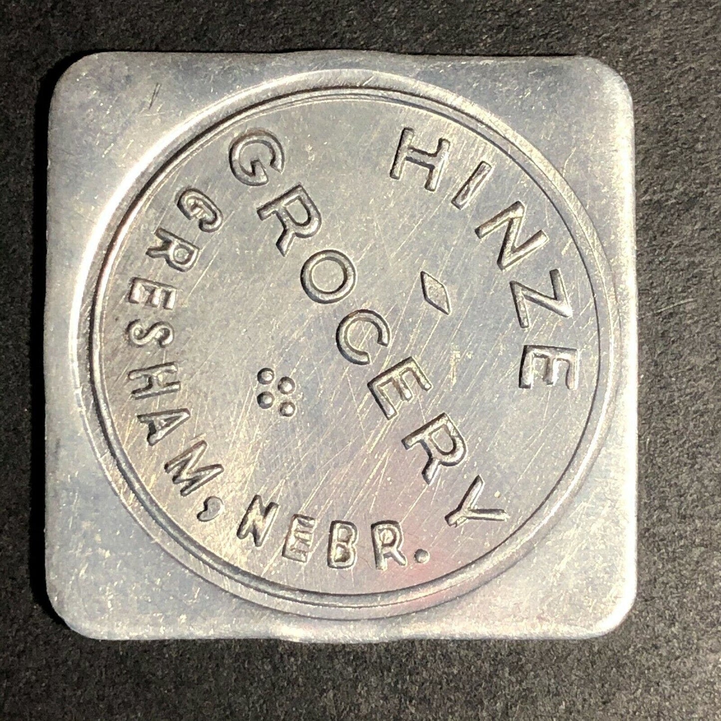 Hinze Grocery 31mm Aluminum Token "Good For $1.00 In Trade" Gresham, Nebraska