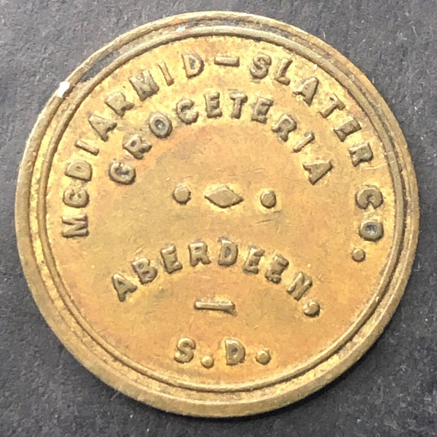 Aberdeen, SD McDiarmid-Slater Groceteria Trade Token Brass 21.5mm Scarce