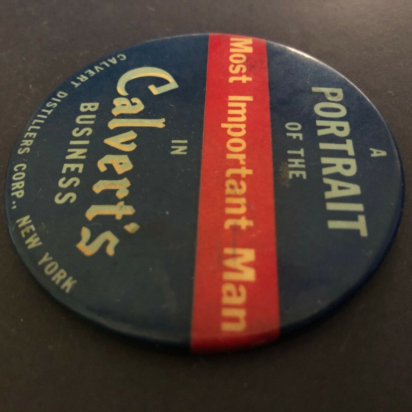 Calvert Distillers Advertising Mirror / Paperweight 2 1/2" "Most Important Man"