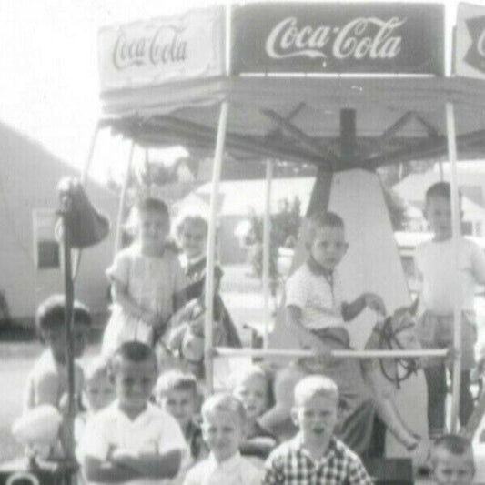 1961 Virginia B&W Photograph - Kids Pose on Portable Merry-Go-Round Coca Cola