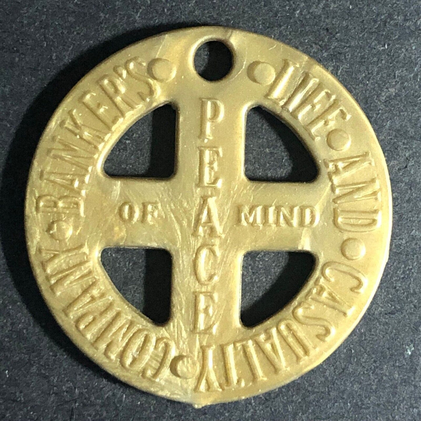 "Banker's Life and Casualty Company" (Chicago) Piece of Mind Plastic Token 26mm