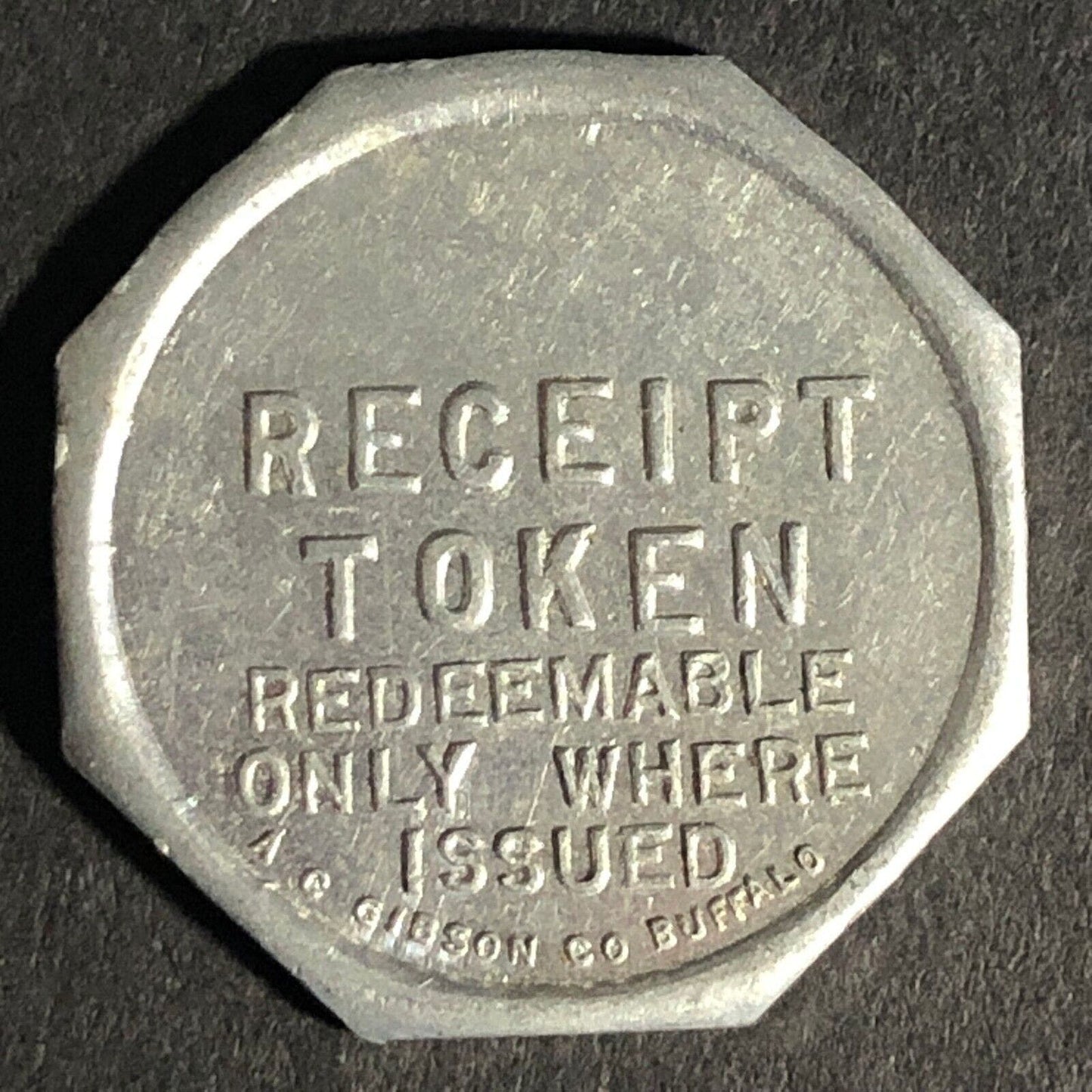 A.C. Gibson Co. 2300 Genesee St. Buffalo Alum. Receipt Token Octagon 22.84mm
