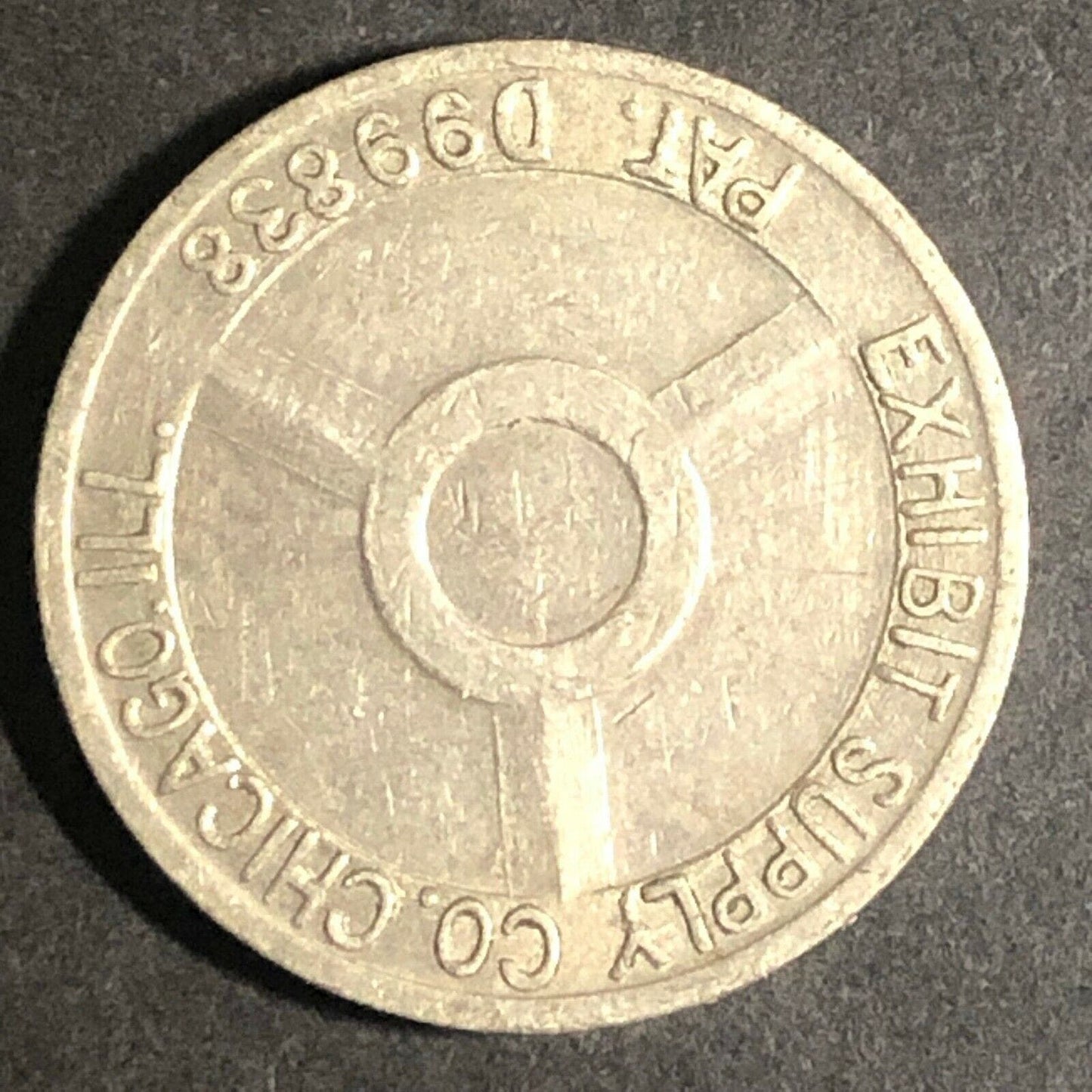 Vintage 20mm Plated Brass "Exhibit Supply Co. Chicago Pat D99838" Token