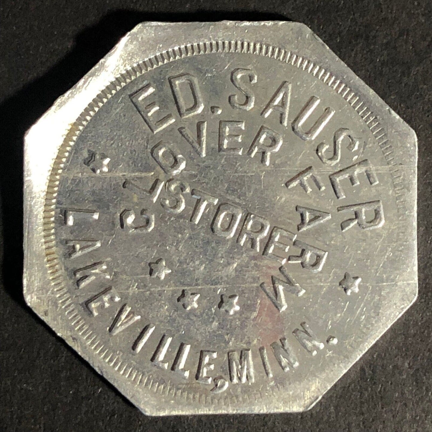 Ed. Sauser Clover Farm Store Lakeville, MN 50c Octagon Alum. Token 32mm Scarce