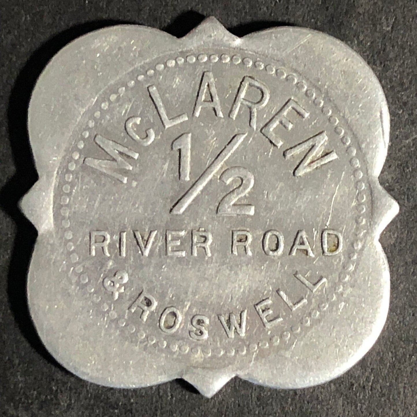 McLaren 1/2 River Road & Roswell (Tonawanda, NY) Scalloped Alum Token 27.8mm