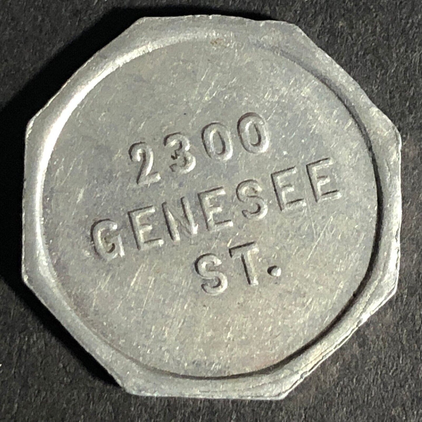 A.C. Gibson Co. 2300 Genesee St. Buffalo Alum. Receipt Token Octagon 22.84mm