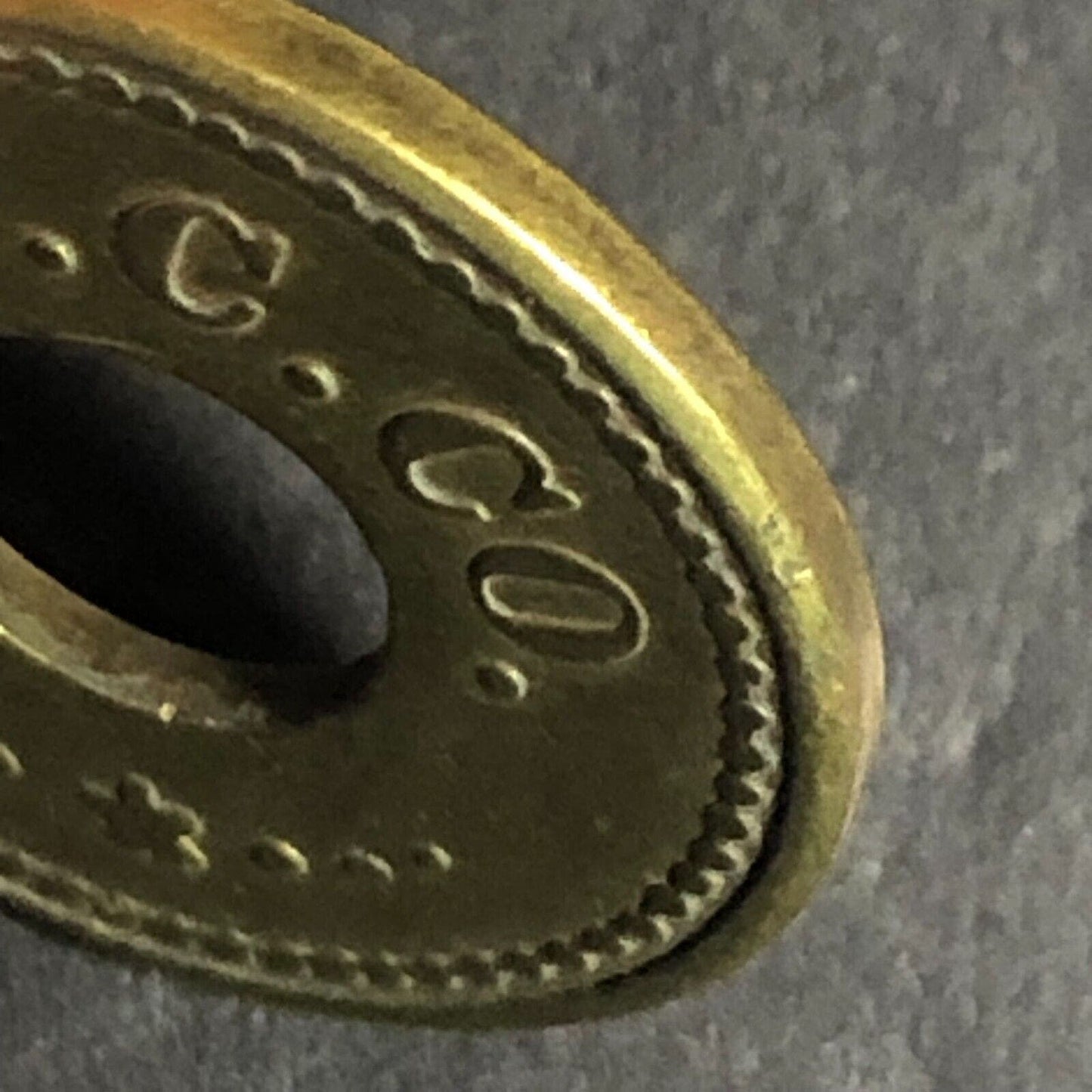 N.W.C. Co. (Seattle Northwestern Candy Co.) Brass 5c Trade Token Donut 21mm