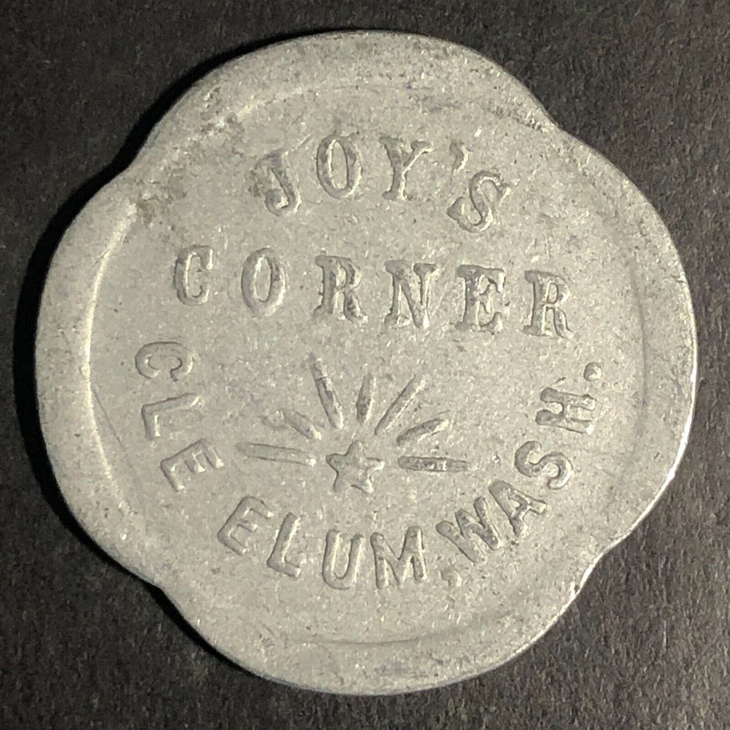 Joy's Corner Cle Elum, Washington Scalloped Aluminum G/F 10c Trade Token -- 28mm