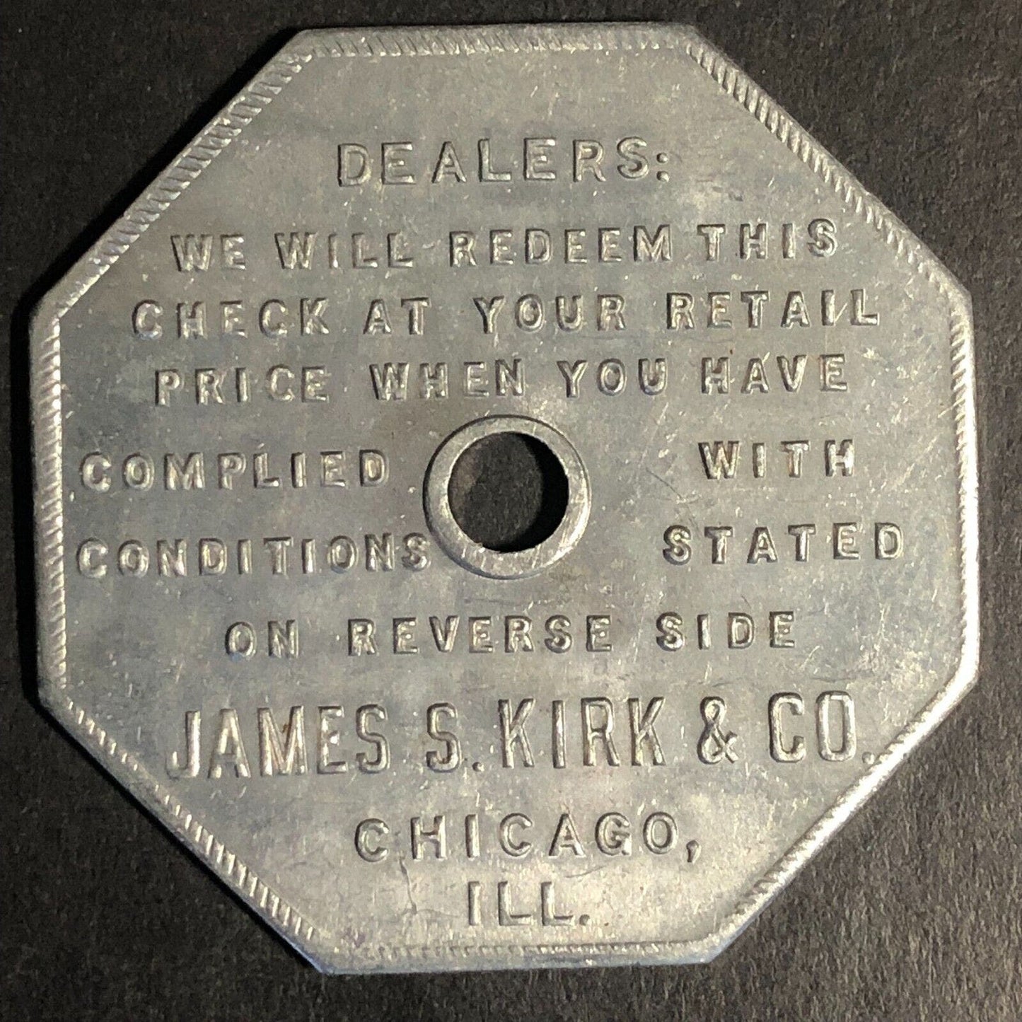 Kirk's Cocoa / Cheerio Alum Trade Token 37 x 37mm Hexagon c1927-30's