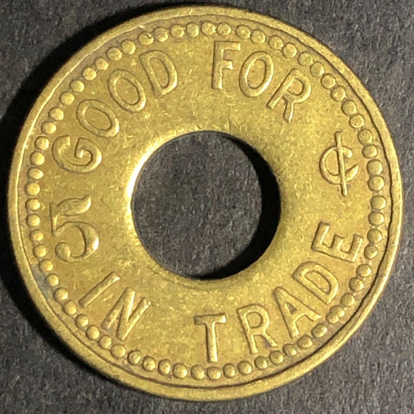 N.W.C. Co. (Seattle Northwestern Candy Co.) Brass 5c Trade Token Donut 21mm