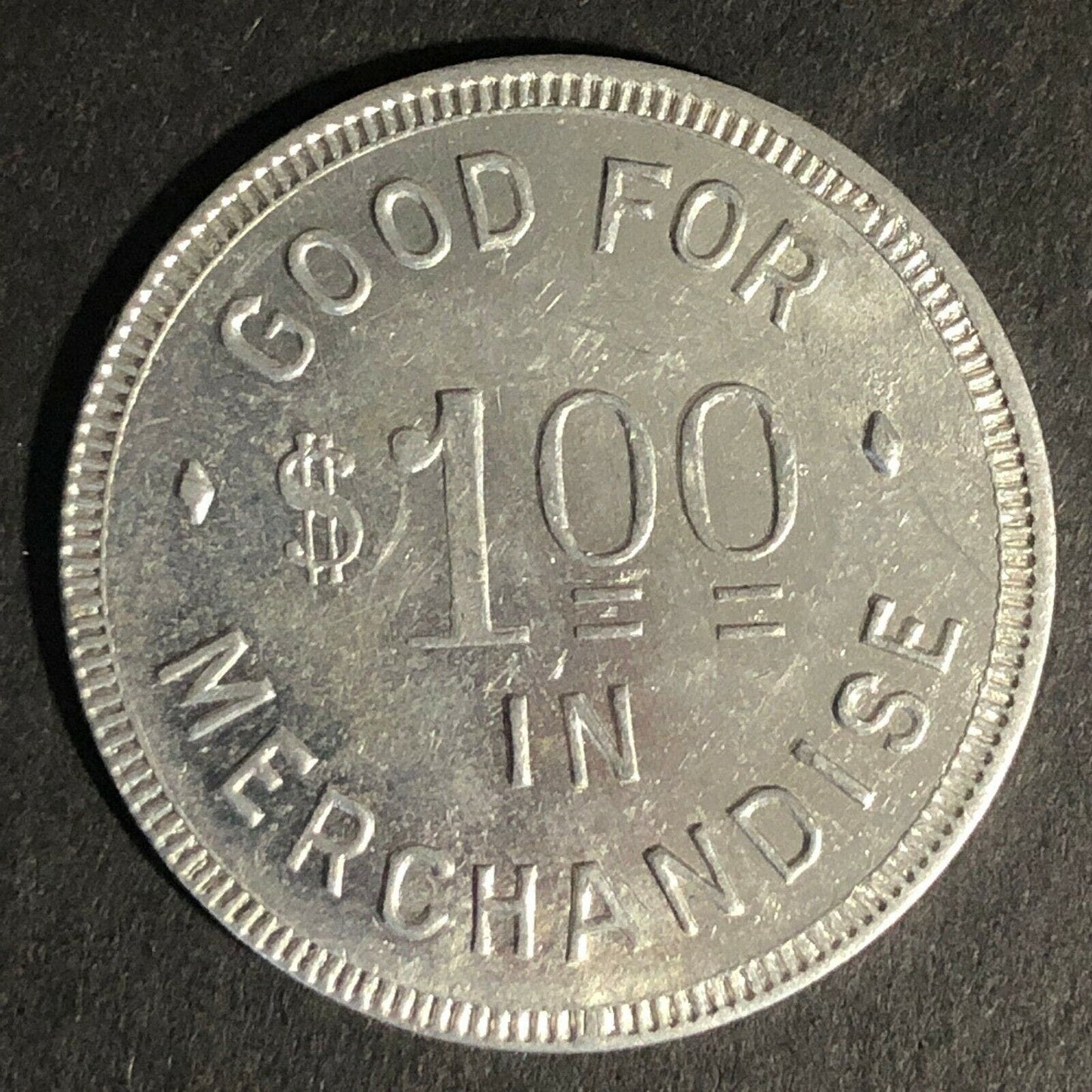 The W.P. Massuere Co. Arcadia, WI Alum. Token G/F $1 in Merchandise 31mm