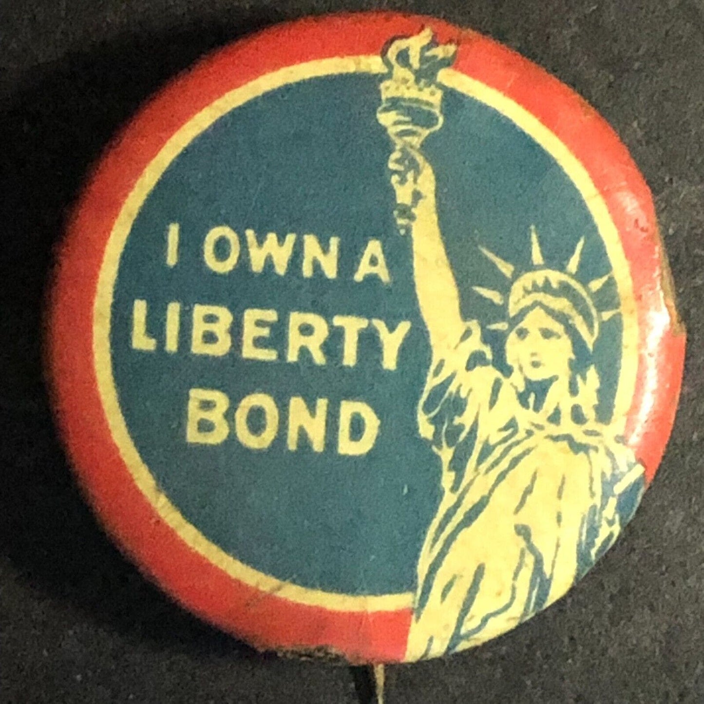 WWI "I Own a Liberty Bond" Statue Celluloid Steel Pinback Button 1917