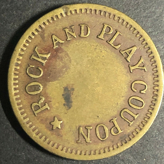 Brass 21.30mm British American Novelty Co. "Rock and Play" Token - Fauver Coll.